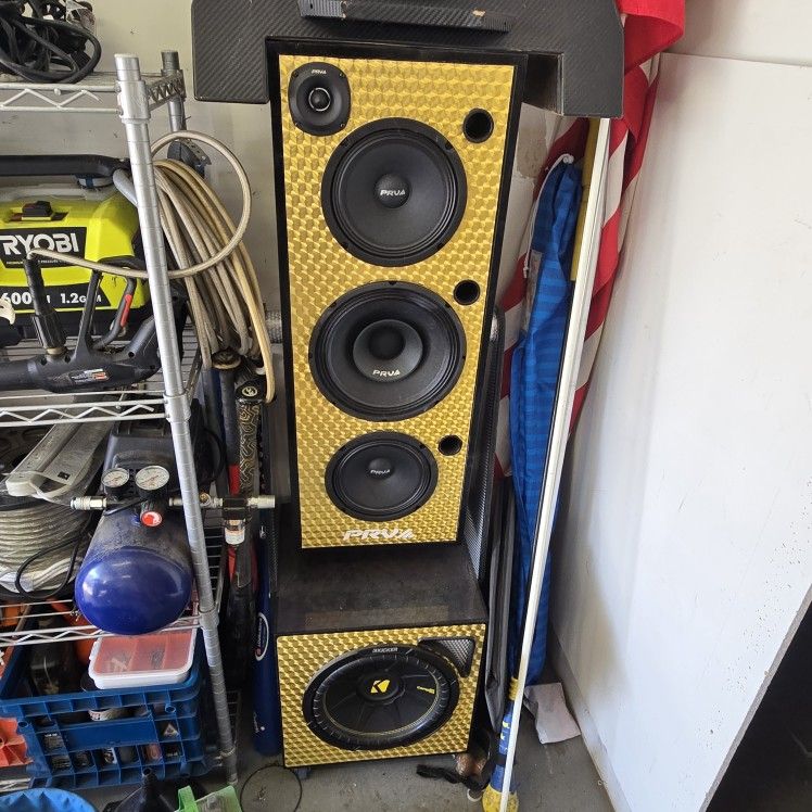 2 Speaker Towers and Sub. Total of 9 Speakers.