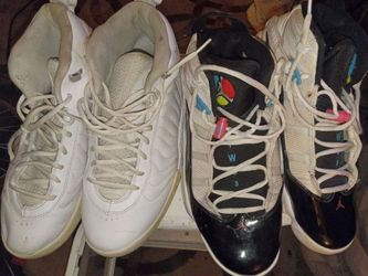 Two Pairs of Air Jordan High-Top Sneakers
