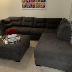 grey left sectional couch & ottoman 