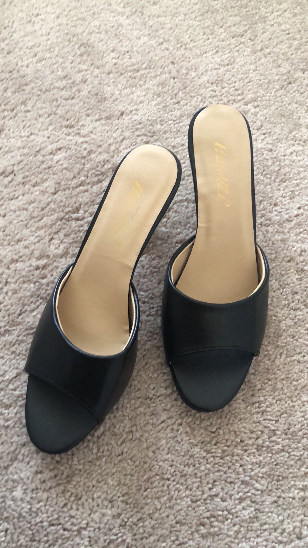 Black under red heel shoe