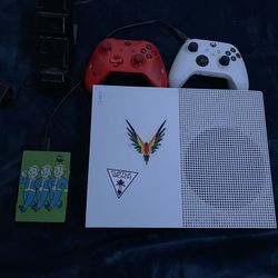 Xbox one S with 2 controllers and 2 tb of storage and games