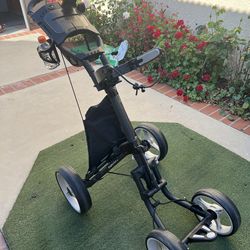 Golf push cart (Caddy Tek//4Wheels,phone holder,Cup holder,use only less than 5 times like new condition)