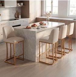 LSSBOUGHT Counter Height Bar Stools Set of 4, Beige Counter Stools with Back and Gold Metal Frame,Modern Barstools with Footrest, Upholstered Leathair