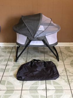 PRACTICALLY NEW PORTABLE BABY BASSINET!!!!