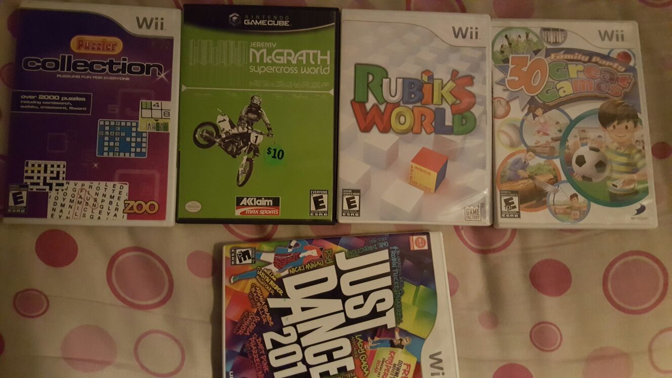 4 wii video games, 1 nintendo gamecube video game