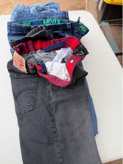 Youth 4 pair of  jeans size 14 adjustable two are Levi’s good condition all for
