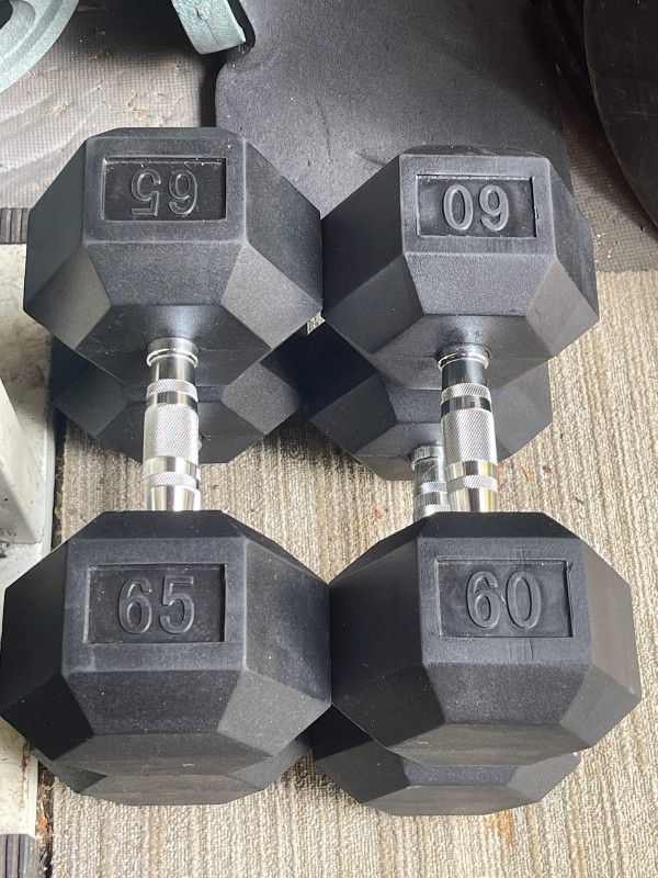 RUBBER HEX DUMBBELLS  :
(PAIRS OF) :  60s = $200  &  65s  = $220 
   *    *  *   Will Sell Separately 