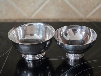 2 silver bowls