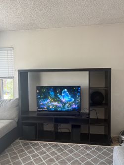 Large black wood tv stand/ shelves