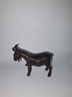 Antique bronze goat statue