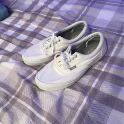 Vans White Slip-Ons