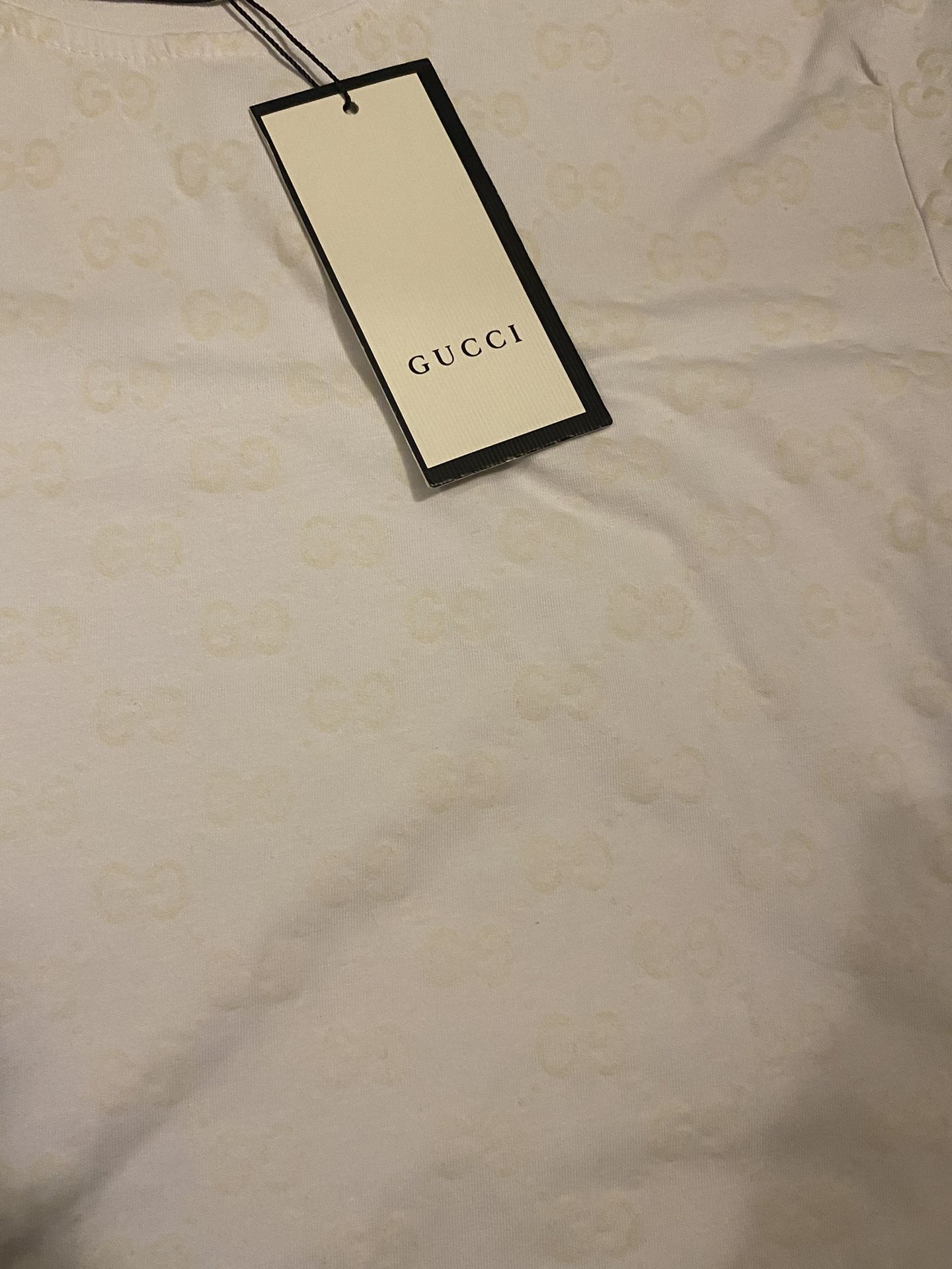 GUCCI SHIRT (PRICE IS NEGOTIABLE)