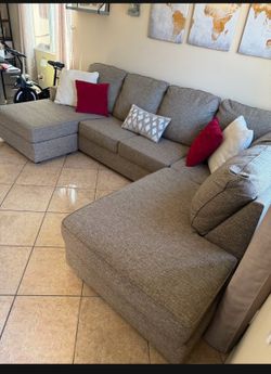 Beautiful light Brown sectional couch with double chaise