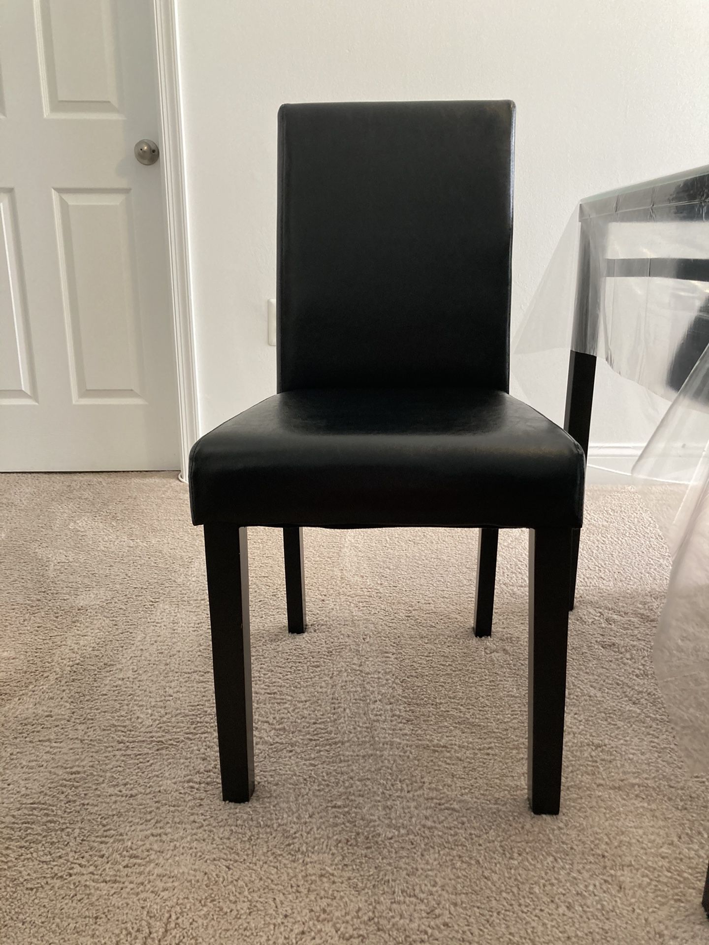 2 Brand new black leather chairs