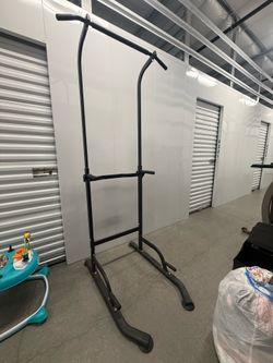 Adjustable height pull up bar and dip bars