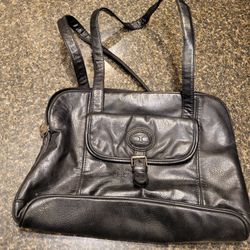 Purse Tan Sac black zippered purse with Tan Sac tree logo and metal badge