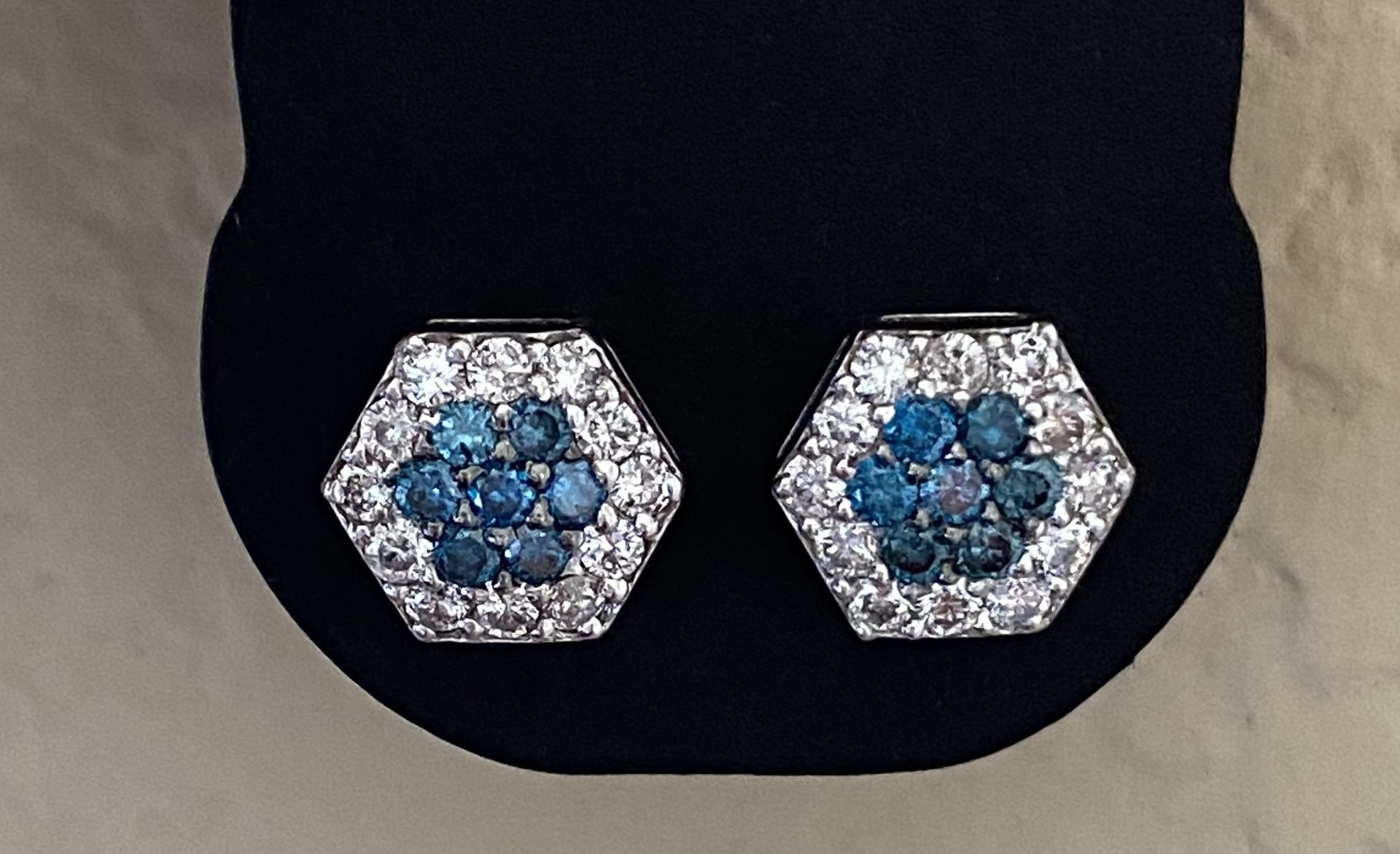 Blue and white diamond cluster earrings - $1,800