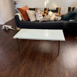 CB2 marble coffee table with custom glass cover