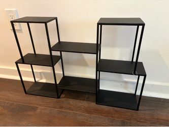 Black multi-tiered shelf