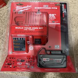 Milwaukee M18 Battery And Charger. Brand New. 