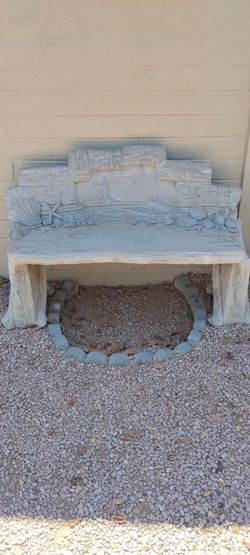 Stone bench ocean sculpted