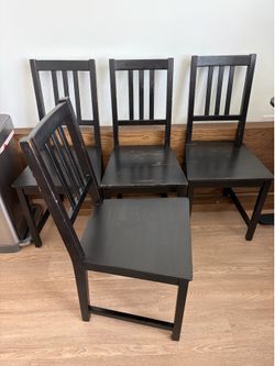 4 black dining chairs