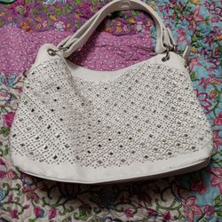 My wife is selling her brand new purse