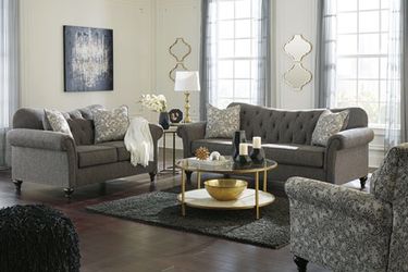 Sofa and love new Wholesale Furniture Center 25 w 39th street Kansas City mo 64111