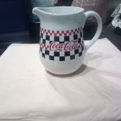 Coca-cola pitcher.