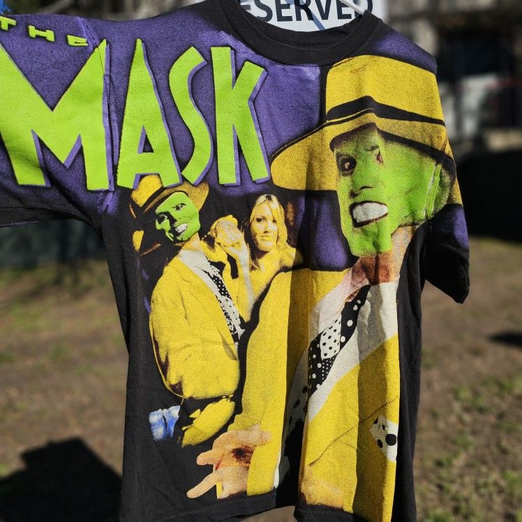 Large. “BOOT” The Mask single stitch shirt. Tultex tag. Smells great. 100% cotton. All over print. AOP. A fantastic retro shirt you will love.
