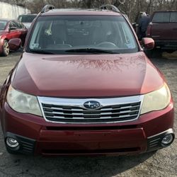 2010 Red Subaru forester 2.5x