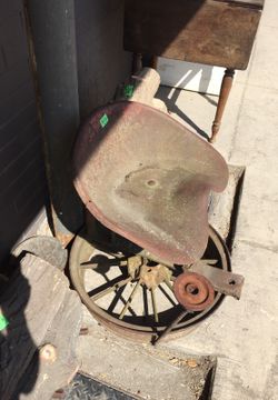 Farm Tractor seat with wagon wheel base