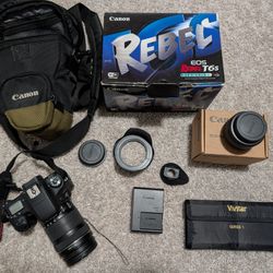 Canon T6S with 18-135mm lens, additional 50mm f/1.8 lens, Extras