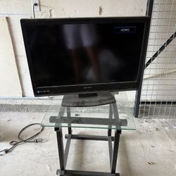 32 Inch Tv w/ Glass Table