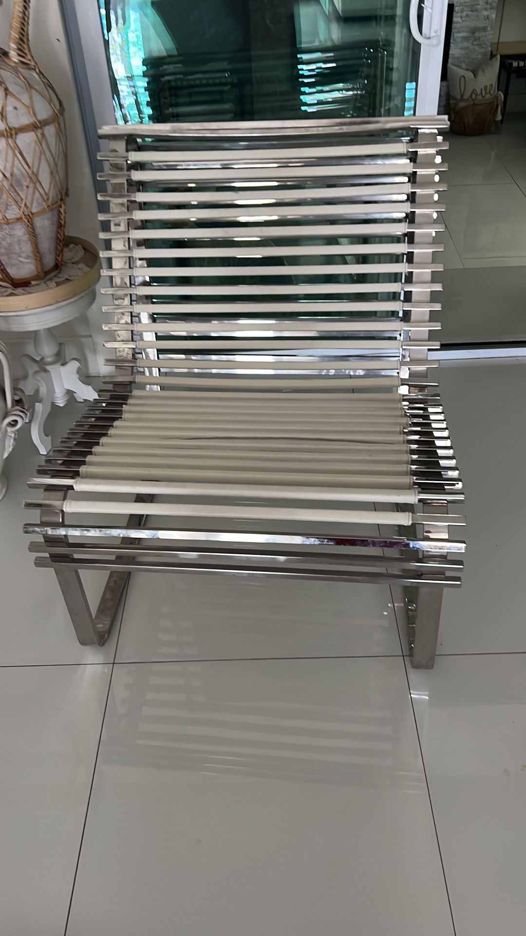 this stunning contemporary metal and leather chair that usually goes for over 1k, currently on offer. Don't miss out! 🛍️ 💺