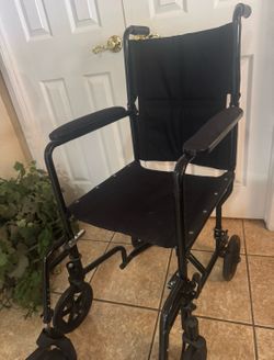 Medical transport chair. Folds quick , easily  & compact.