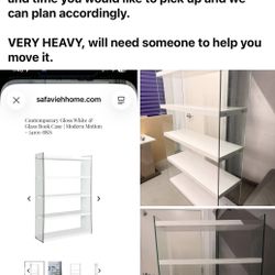 White glass shelves-  4ft 5” L x 16”W x 6ft 3”  Is in storage. If interested please give date and time you would like to pick up and we can plan accor