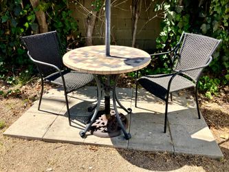 Cute bistro table and two chairs, umbrella not included - $20 obo