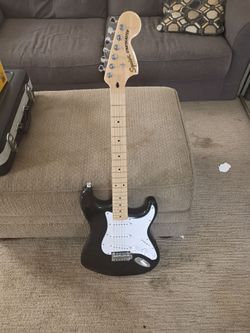 Used electric guitar