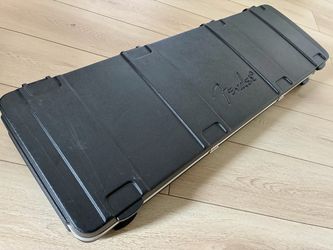 Original Fender TSA flight Bass hard shell case.
