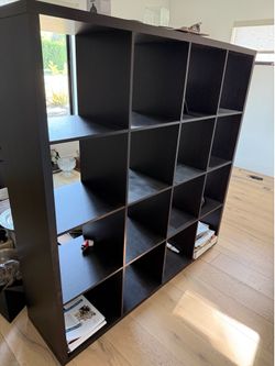 Heavy duty 16-cube storage shelving unit.