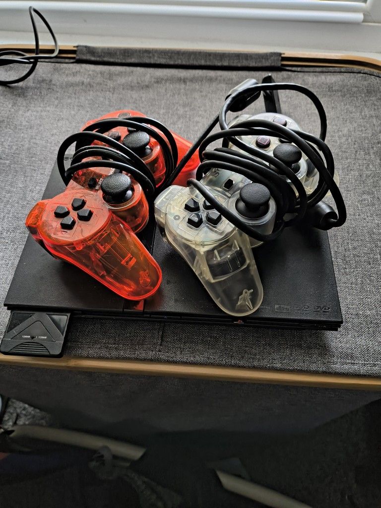 PS2 With Two Controllers And Games