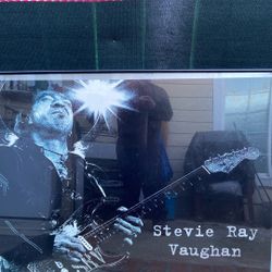 It’s A Picture Of Stevie Ray Vaughan Playing His Guitar Frame Black