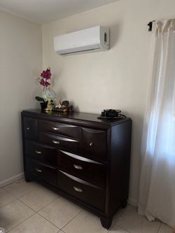 Dark Wood Dresser with Multiple Drawers