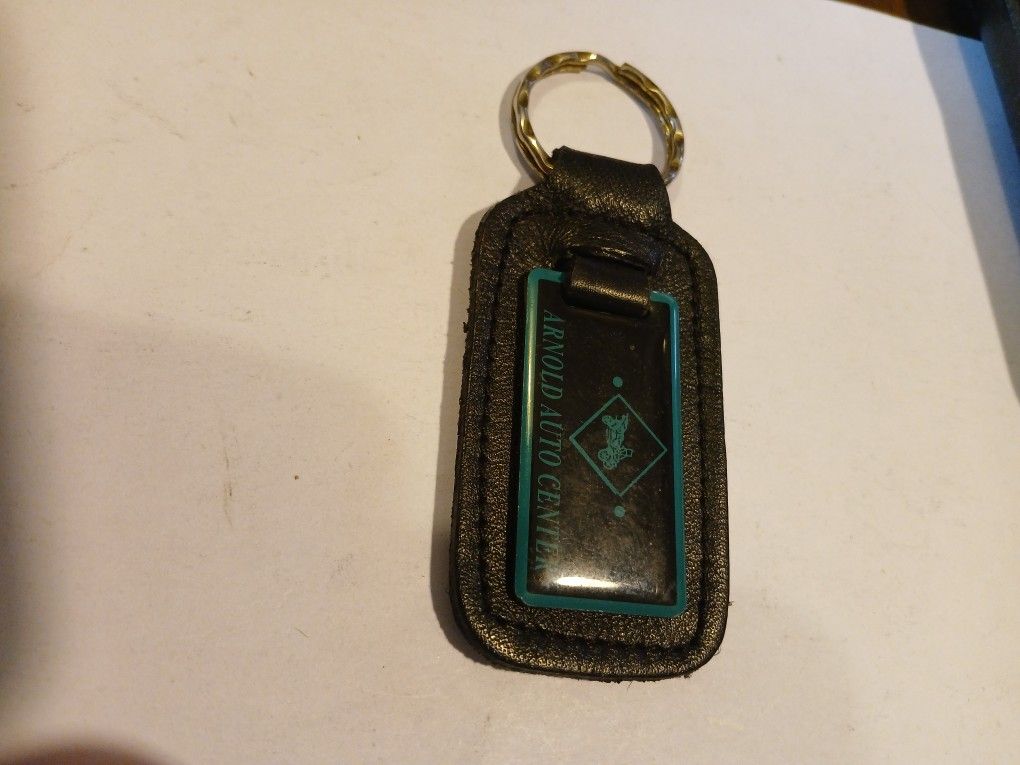 Vintage Leather Keychain With Ring And Emblem On The Leather Saying Arnold Auto Center Apache Junction Arizona