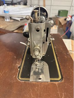 Sewing machine with table