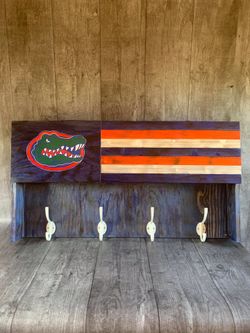 Gator hat/coat rack with concealment area