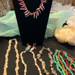 5 necklaces and 2 pairs of earrings