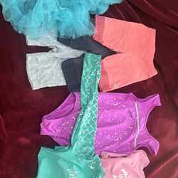 Gymnastics Bundle With 2 Rashguards And A Tutu Skirt For Girls Ages 6-7. Take All For Price Listed. No Lower. Firm On Price 