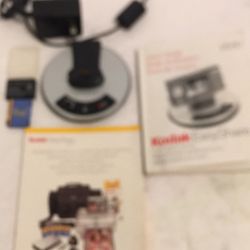 Kodak EasyShare Photo Frame Dock for Digital Camera. Also comes with battery charging cable & 2 Batteries (Kodak Rechargeable 600 MAH & Kidak ali-ion 